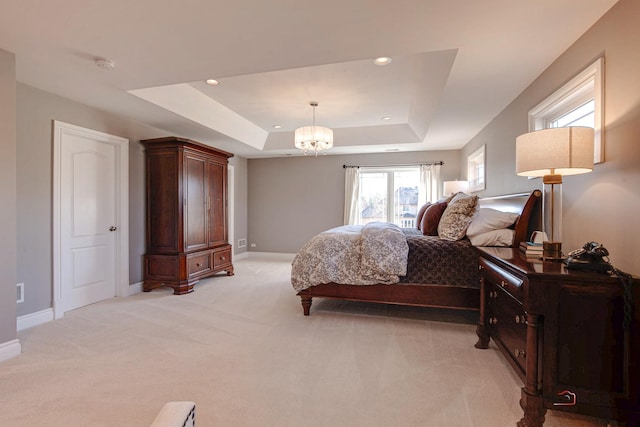 38868 Oakcrest Ln, Wadsworth, IL 60083 - bedroom featuring a chandelier, light carpet, baseboards, a tray ceiling, and recessed lighting