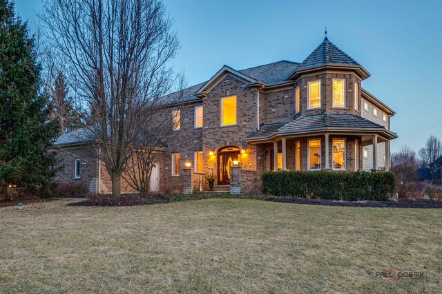 38868 Oakcrest Ln, Wadsworth, IL 60083 - view of front facade with a front lawn and brick siding