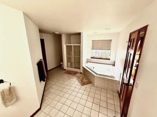 1849 Moorland Ln, Crystal Lake, IL 60014 - full bath with a stall shower, a bath, tile patterned flooring, toilet, and baseboards