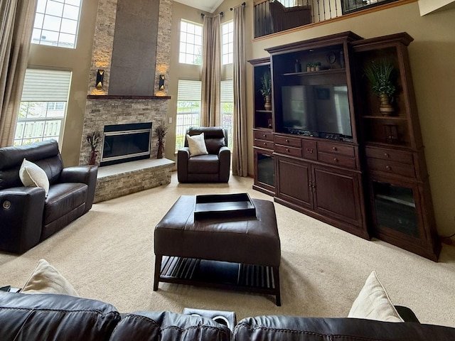 1849 Moorland Ln, Crystal Lake, IL 60014 - living area with carpet flooring, high vaulted ceiling, healthy amount of natural light, and a stone fireplace