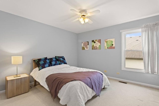 857 Bluestem Dr, Bolingbrook, IL 60440 - bedroom featuring light colored carpet, baseboards, and ceiling fan