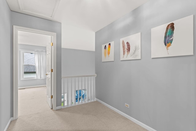 857 Bluestem Dr, Bolingbrook, IL 60440 - hallway with an upstairs landing, carpet, baseboards, and attic access