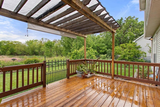 857 Bluestem Dr, Bolingbrook, IL 60440 - deck featuring a pergola, a lawn, and view of wooded area