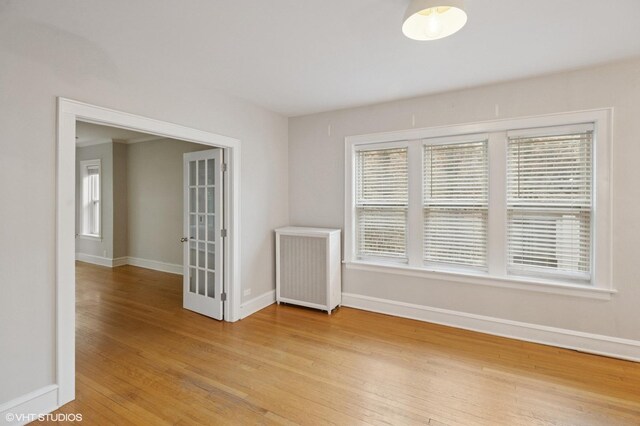 1620 W Olive Ave Unit 3A, Chicago, IL 60660 - spare room featuring light wood-style flooring and baseboards