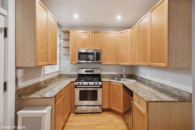 1620 W Olive Ave Unit 3A, Chicago, IL 60660 - kitchen with appliances with stainless steel finishes, light wood-style flooring, a sink, open shelves, and light brown cabinets
