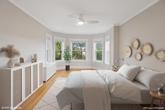 1620 W Olive Ave Unit 3A, Chicago, IL 60660 - bedroom featuring light wood-style floors, ornamental molding, baseboards, and ceiling fan
