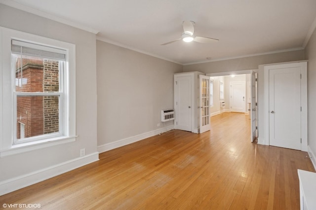 1620 W Olive Ave Unit 3A, Chicago, IL 60660 - empty room featuring a ceiling fan, light wood-style floors, crown molding, and baseboards