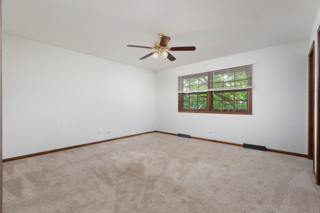 30W265 Briar Ln, Naperville, IL 60563 - spare room featuring carpet floors, a ceiling fan, and baseboards