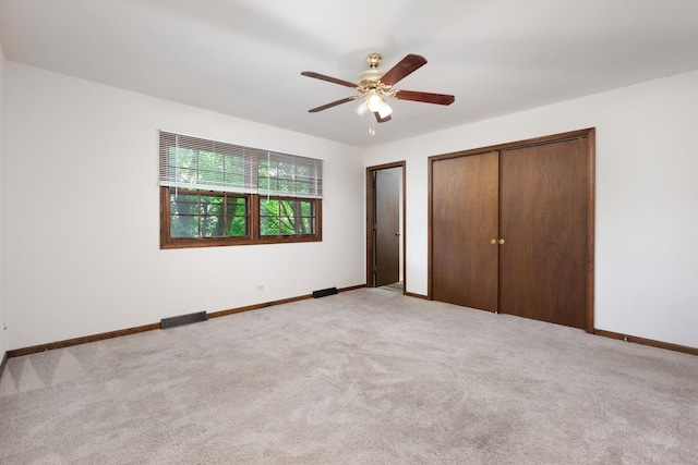 30W265 Briar Ln, Naperville, IL 60563 - unfurnished bedroom with light carpet, baseboards, and a ceiling fan