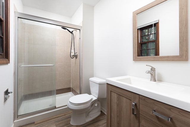 30W265 Briar Ln, Naperville, IL 60563 - bathroom with vanity, toilet, a shower stall, and wood finished floors