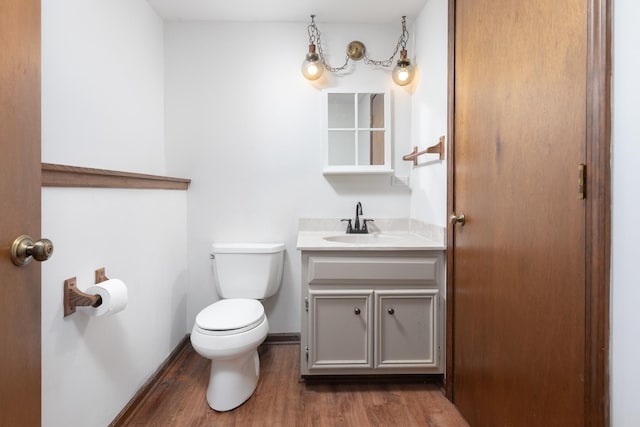 30W265 Briar Ln, Naperville, IL 60563 - bathroom featuring vanity, toilet, and wood finished floors