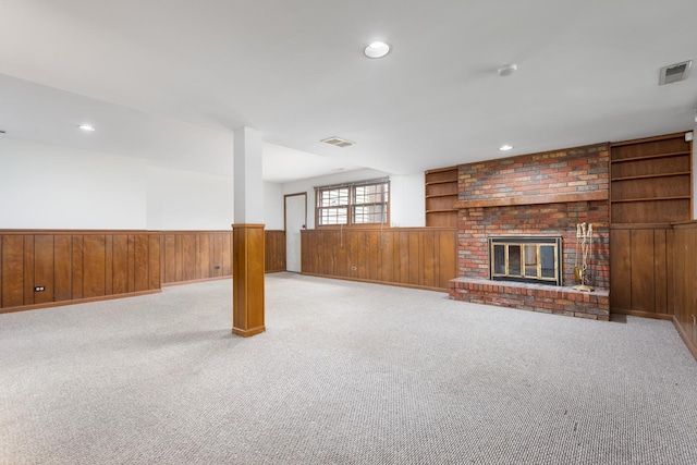 30W265 Briar Ln, Naperville, IL 60563 - unfurnished living room with wood walls, wainscoting, recessed lighting, carpet flooring, and a fireplace