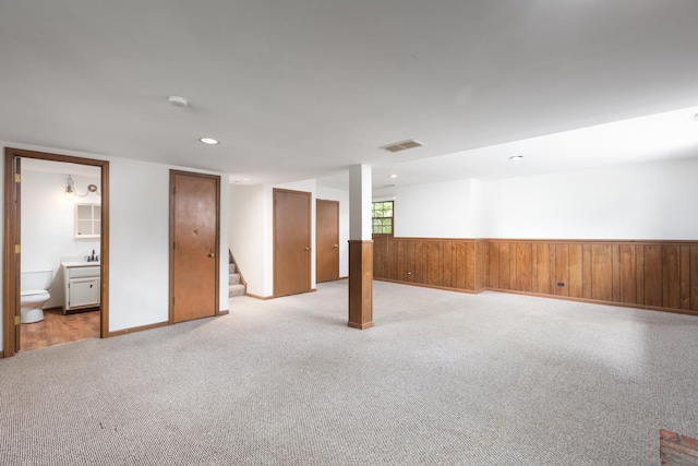 30W265 Briar Ln, Naperville, IL 60563 - basement with stairway, light carpet, wood walls, recessed lighting, and wainscoting