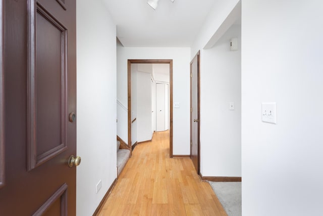 30W265 Briar Ln, Naperville, IL 60563 - hallway featuring light wood-type flooring, baseboards, and stairway