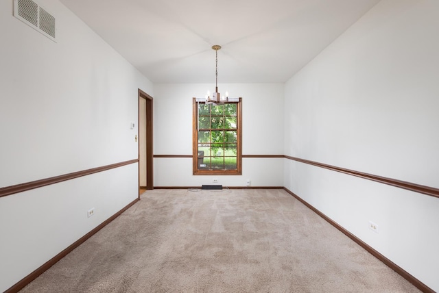 30W265 Briar Ln, Naperville, IL 60563 - unfurnished room featuring a chandelier, light carpet, and baseboards
