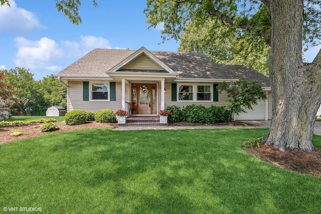 862 Wimbleton Ln, Crystal Lake, IL 60014 - bungalow-style house featuring a front lawn, an attached garage, a shed, and a shingled roof