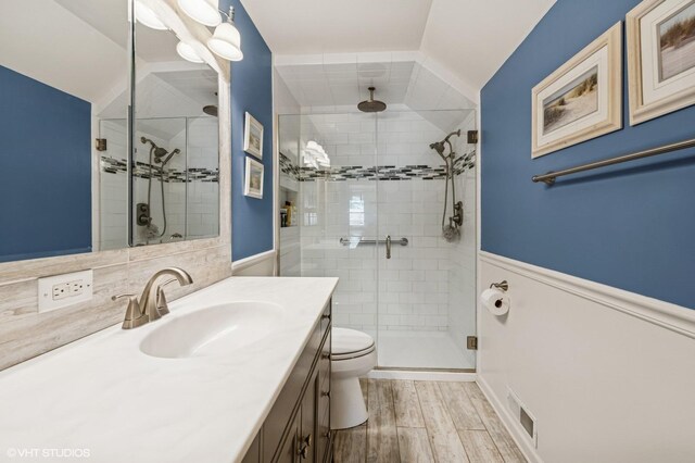 862 Wimbleton Ln, Crystal Lake, IL 60014 - full bath with a stall shower, vanity, toilet, wood finished floors, and wainscoting