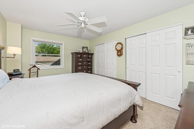 862 Wimbleton Ln, Crystal Lake, IL 60014 - bedroom with multiple closets, ceiling fan, and light carpet
