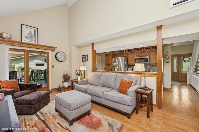 862 Wimbleton Ln, Crystal Lake, IL 60014 - living area with light wood-type flooring, baseboards, high vaulted ceiling, and recessed lighting