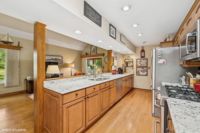 862 Wimbleton Ln, Crystal Lake, IL 60014 - kitchen with a sink, stainless steel appliances, light wood-style flooring, a peninsula, and plenty of natural light