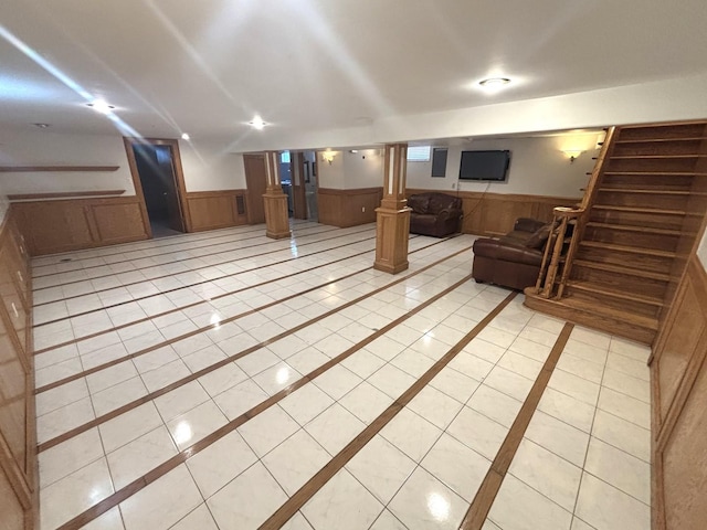 1 Marlin Dr, Oswego, IL 60543 - finished below grade area with a wainscoted wall, inlaid floor details, and light tile patterned flooring