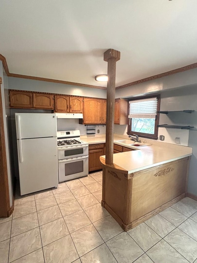 1 Marlin Dr, Oswego, IL 60543 - kitchen featuring freestanding refrigerator, range with two ovens, under cabinet range hood, brown cabinets, and light countertops