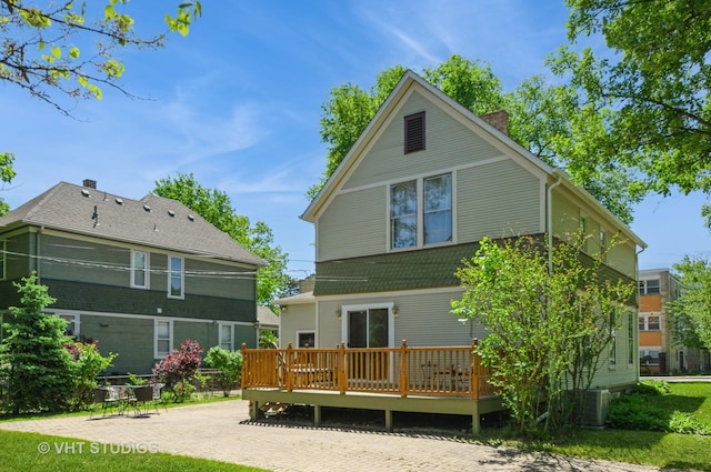 128 Forest Ave, Riverside, IL 60546 - back of property featuring a wooden deck and central AC