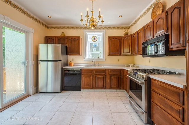128 Forest Ave, Riverside, IL 60546 - kitchen with black appliances, a sink, light countertops, a chandelier, and brown cabinetry