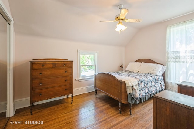 128 Forest Ave, Riverside, IL 60546 - bedroom featuring lofted ceiling, wood finished floors, baseboards, and a ceiling fan