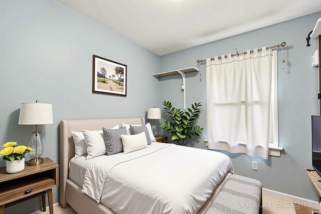 2110 Hermon Ave, Zion, IL 60099 - bedroom featuring baseboards and carpet flooring