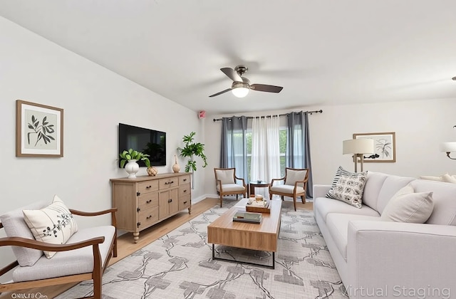 2110 Hermon Ave, Zion, IL 60099 - living room with a ceiling fan, light wood finished floors, and baseboards