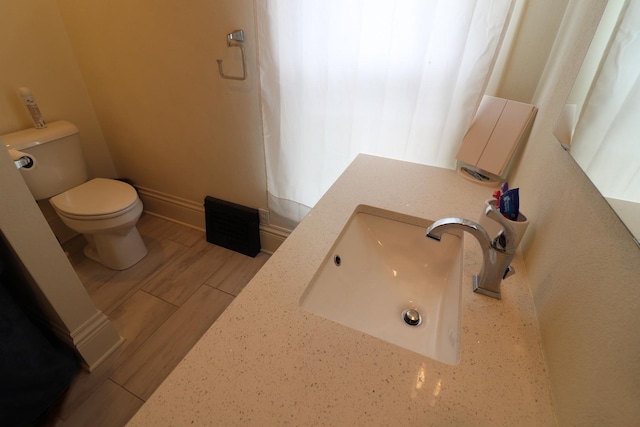 4977 N Mount Vernon Rd, Forreston, IL 61030 - bathroom with toilet and vanity