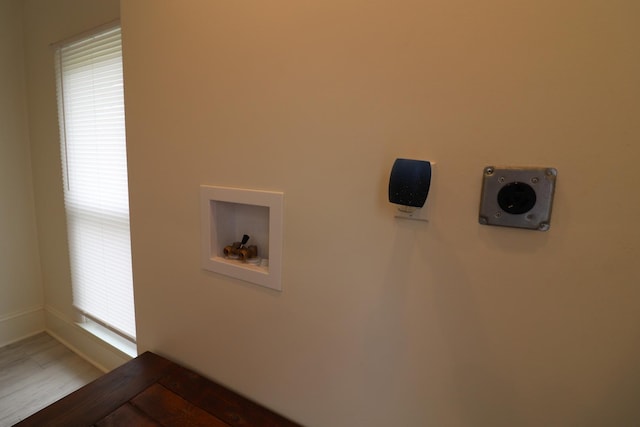 4977 N Mount Vernon Rd, Forreston, IL 61030 - washroom with baseboards and wood finished floors