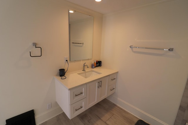 4977 N Mount Vernon Rd, Forreston, IL 61030 - bathroom featuring vanity, baseboards, and crown molding