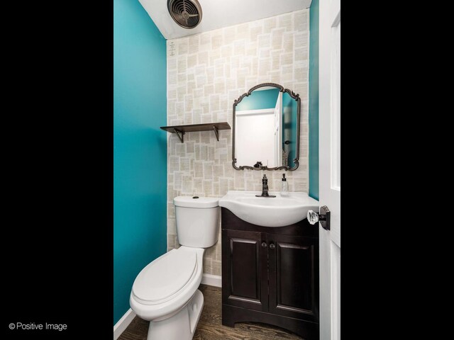 421 S River Rd, Naperville, IL 60540 - bathroom with toilet, vanity, and wood finished floors