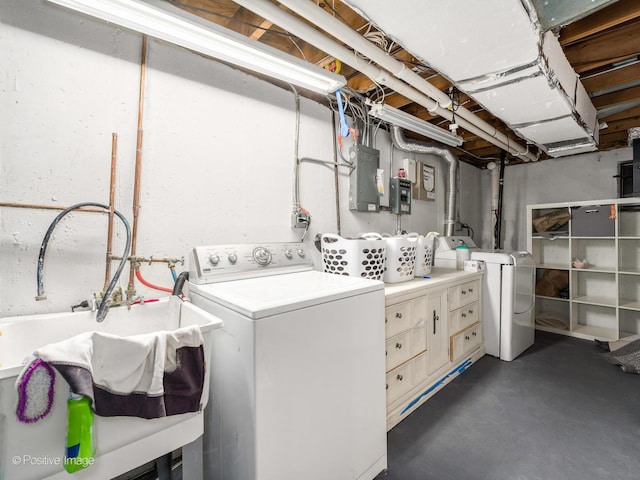 421 S River Rd, Naperville, IL 60540 - laundry room featuring washer and clothes dryer, electric panel, and cabinet space