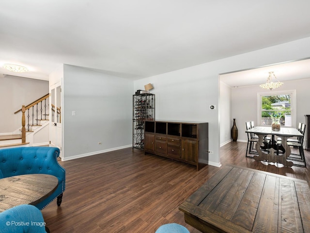 421 S River Rd, Naperville, IL 60540 - living area featuring stairway, a chandelier, wood finished floors, and baseboards