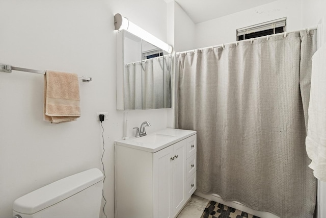 5337 S Ellis Ave Unit 1C, Chicago, IL 60615 - bathroom featuring toilet, vanity, marble look tiles, and curtained shower