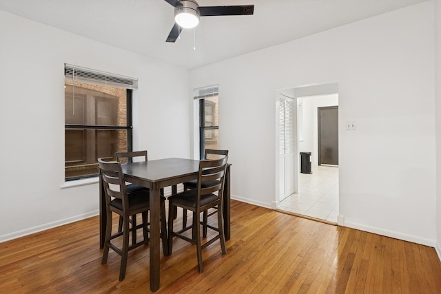 5337 S Ellis Ave Unit 1C, Chicago, IL 60615 - dining room featuring a ceiling fan, light wood-style floors, and baseboards
