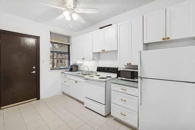 5337 S Ellis Ave Unit 1C, Chicago, IL 60615 - kitchen featuring white appliances, a sink, white cabinetry, a ceiling fan, and a textured ceiling