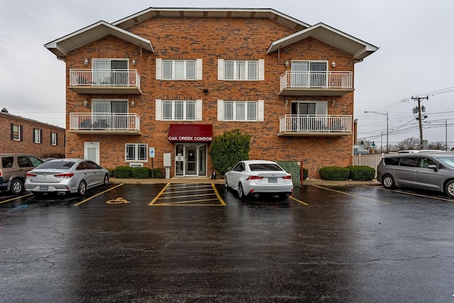 15505 Cicero Ave Unit 2C, Oak Forest, IL 60452 - view of front of property with brick siding and uncovered parking