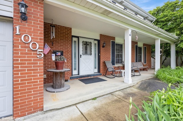 1005 69th St, Darien, IL 60561 - property entrance with covered porch and brick siding