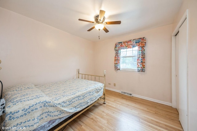 1005 69th St, Darien, IL 60561 - bedroom featuring wood finished floors, baseboards, and a ceiling fan