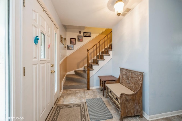 1005 69th St, Darien, IL 60561 - foyer with stairs and baseboards
