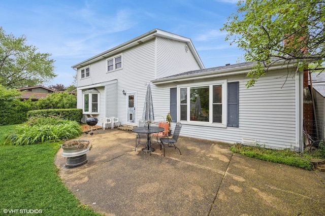 1005 69th St, Darien, IL 60561 - rear view of house with a patio