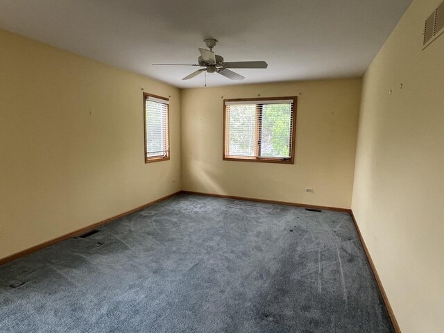 7750 Northfield Ln, Tinley Park, IL 60487 - carpeted empty room with a ceiling fan and baseboards