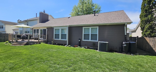973 Willowbrook Dr, Wheeling, IL 60090 - rear view of property featuring central AC unit, a deck, a chimney, and roof with shingles