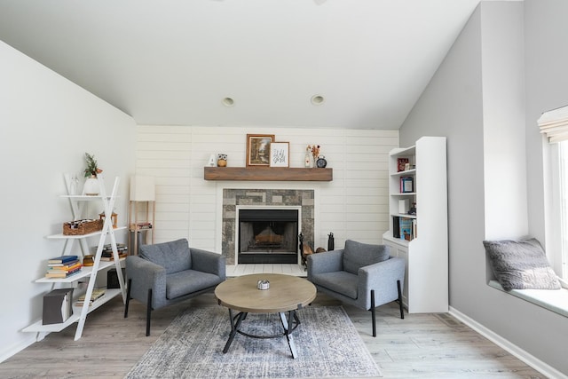 413 W Cook St, Manteno, IL 60950 - living area featuring a fireplace, light wood-style floors, and baseboards