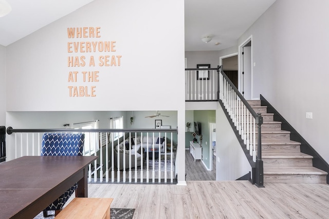 413 W Cook St, Manteno, IL 60950 - stairway featuring wood finished floors, ceiling fan, and baseboards