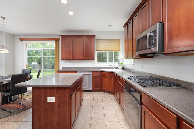 14605 Colonial Pkwy, Plainfield, IL 60544 - kitchen featuring stainless steel appliances, hanging light fixtures, a kitchen island, recessed lighting, and a sink
